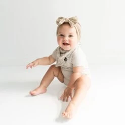 Bib In Oat Leopard 8 Bib In Oat Leopard -Kyte Baby kyte baby bib oat leopard bib in oat leopard 32329612197999