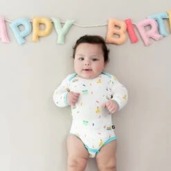 Long Sleeve Bodysuit In Cloud Party -Kyte Baby kyte baby long sleeve bodysuits long sleeve bodysuit in cloud party 32605491626095